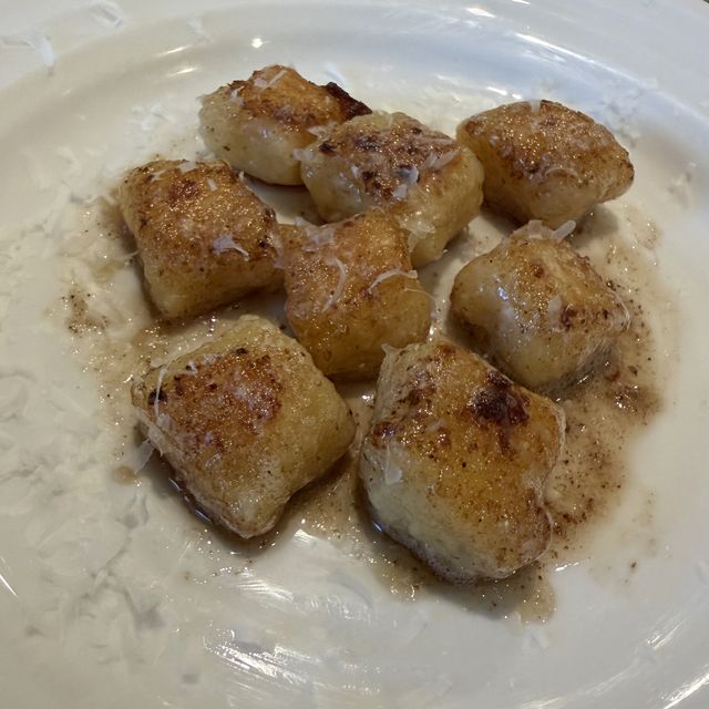 Potato gnocchi browned in butter with parmesan